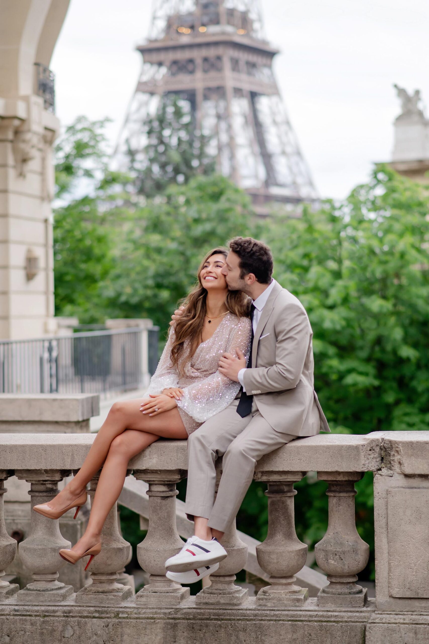 Couple having fun at Avenue de Camoëns during morning Paris couple photoshoot