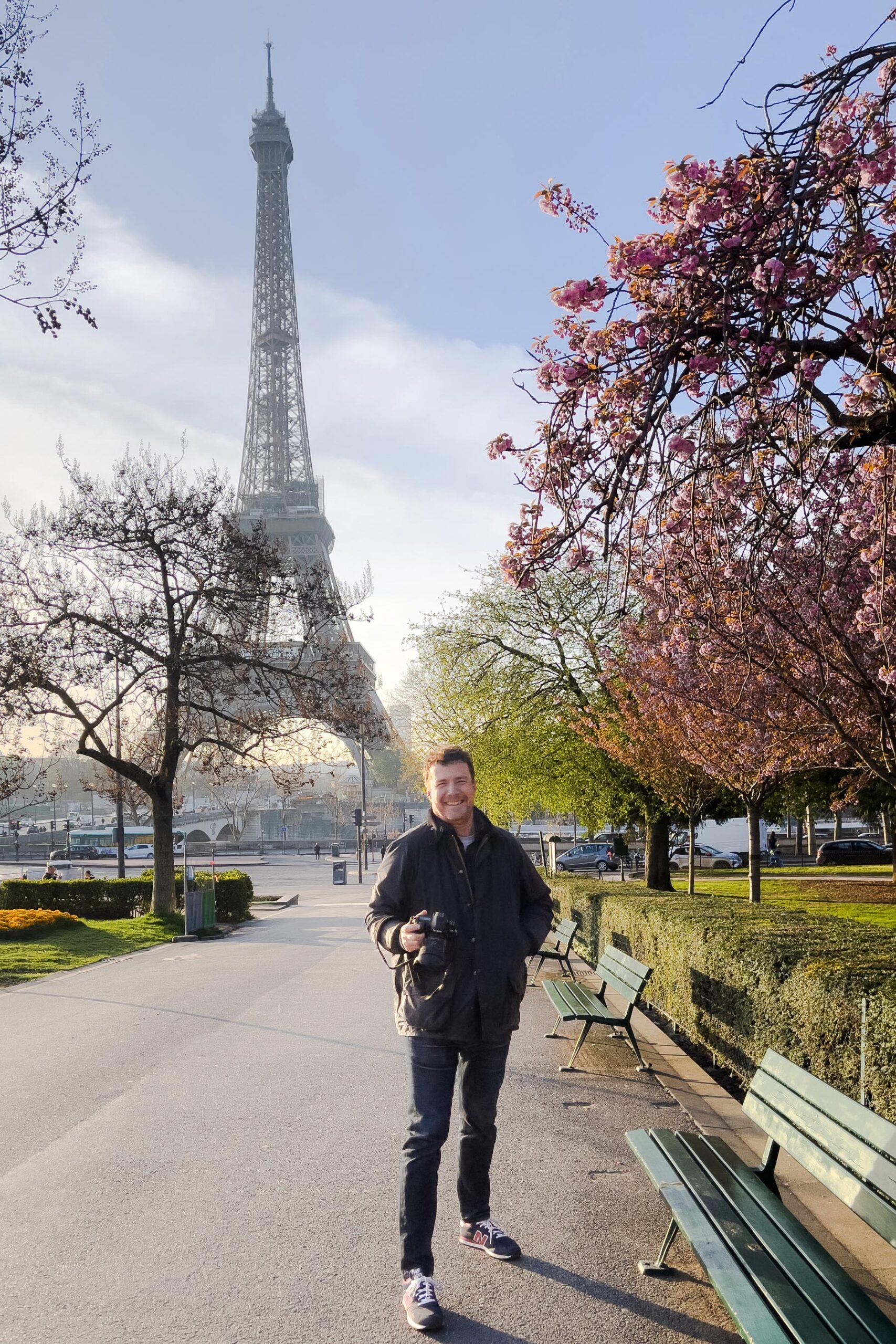Portrait of Paris photographer Pierre Sattin at Trocadéro with Eiffel Tower